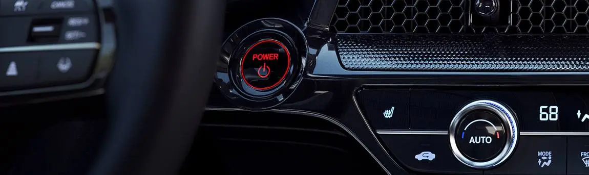דער ENGINE START/STOP קנעפל און די קליימעט קאנטראלן.